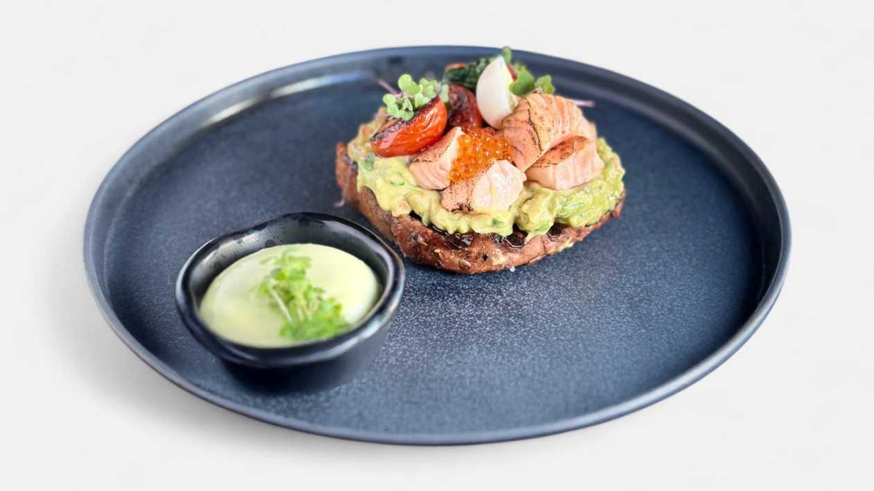 Guacamole, baked salmon and trout roe on toast