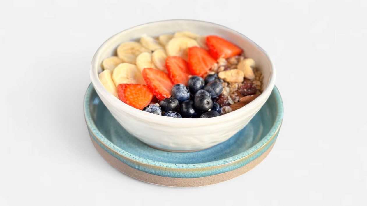 Greek yogurt with homemade granola and fresh seasonal berries