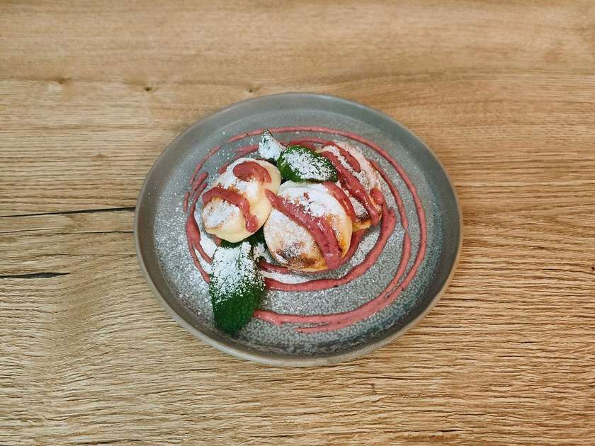 Syrnyky with berry sauce