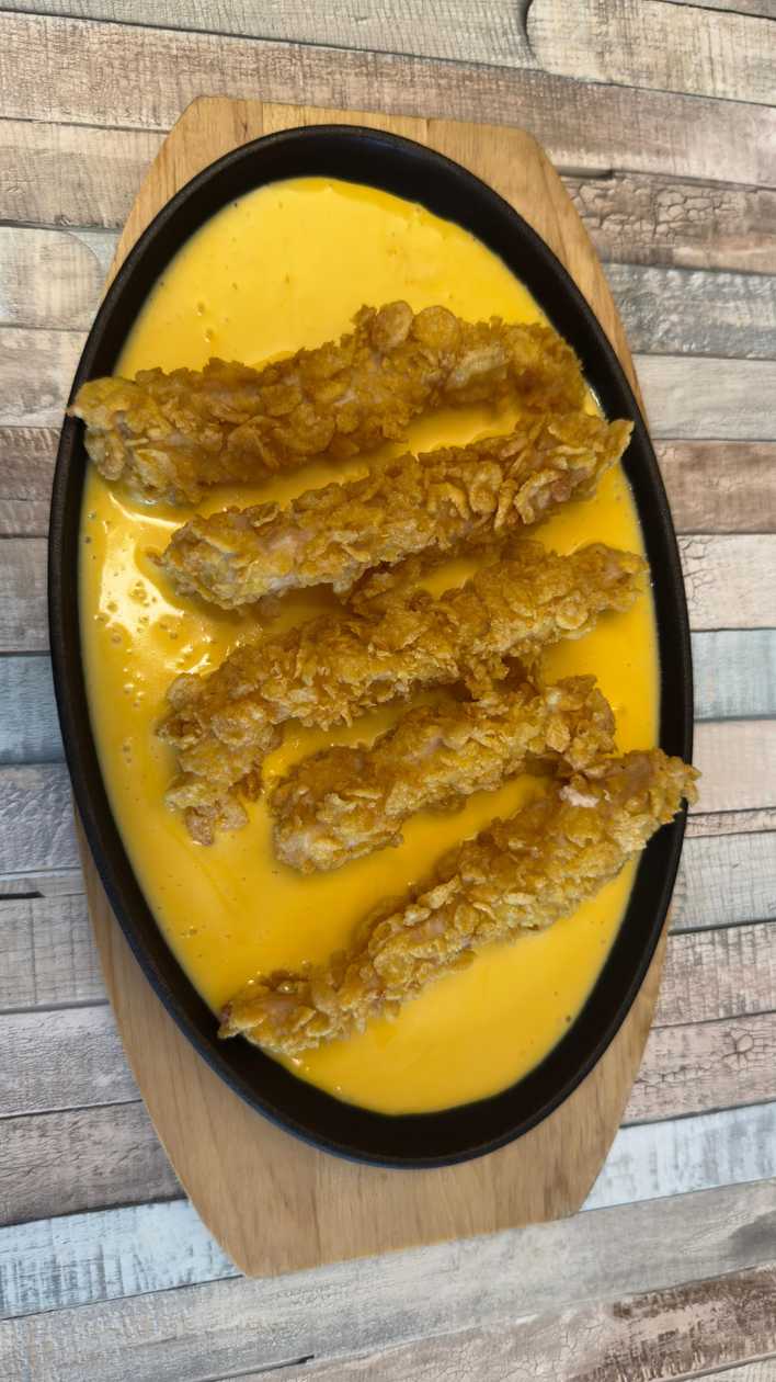 CHICKEN STRIPS IN SOS CHEDDAR
