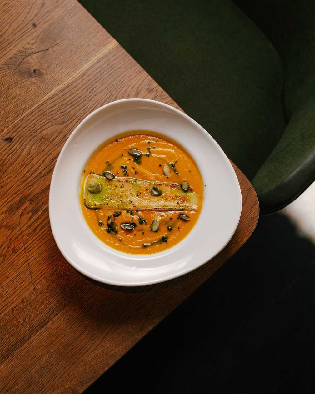 Creamy Pumpkin Soup with Baked Brie