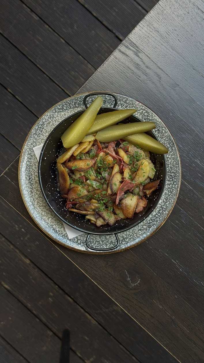 Fried potatoes with onions and bacon