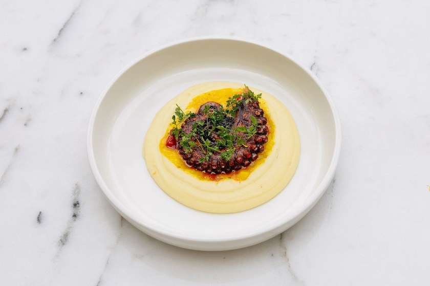 Octopus with purée and mango salsa