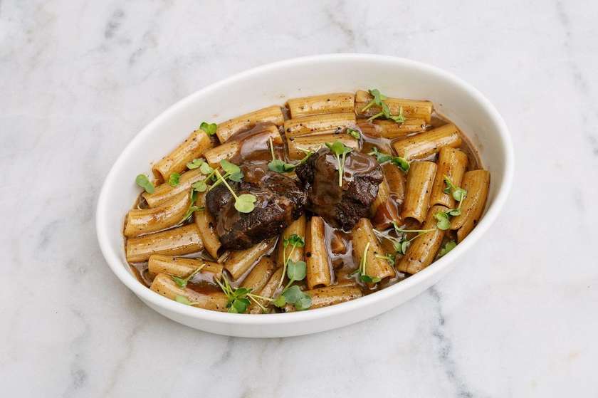 Rigatoni with slow-braised beef cheeks, black pepper, and fermented black garlic