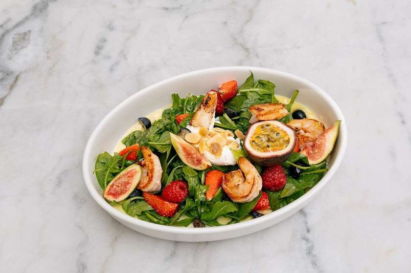 Salad with tiger prawns and passion fruit