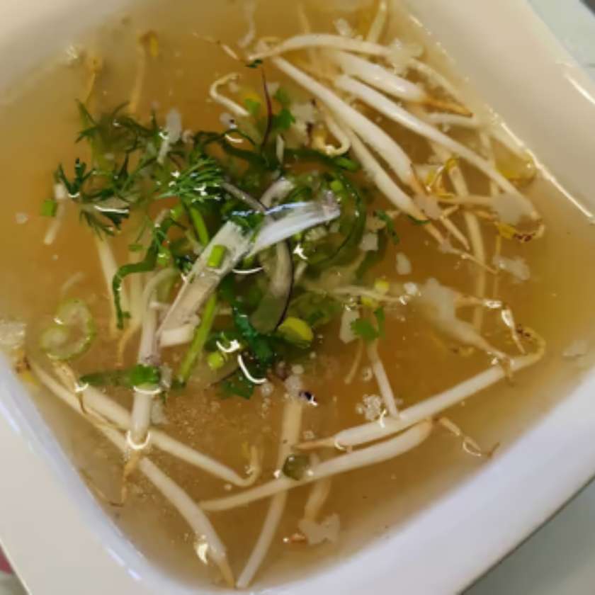 Pho Broth Sprouts and Herbs