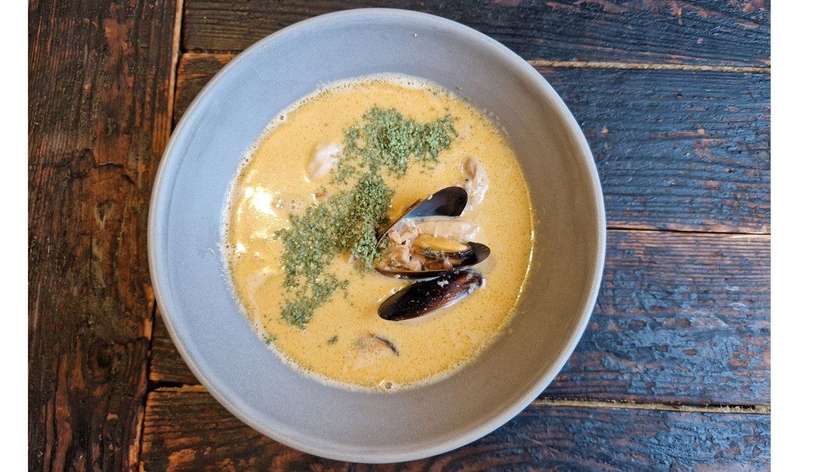 Grey Coconut Milk Soup with Shrimp, Mussels, and Chicken