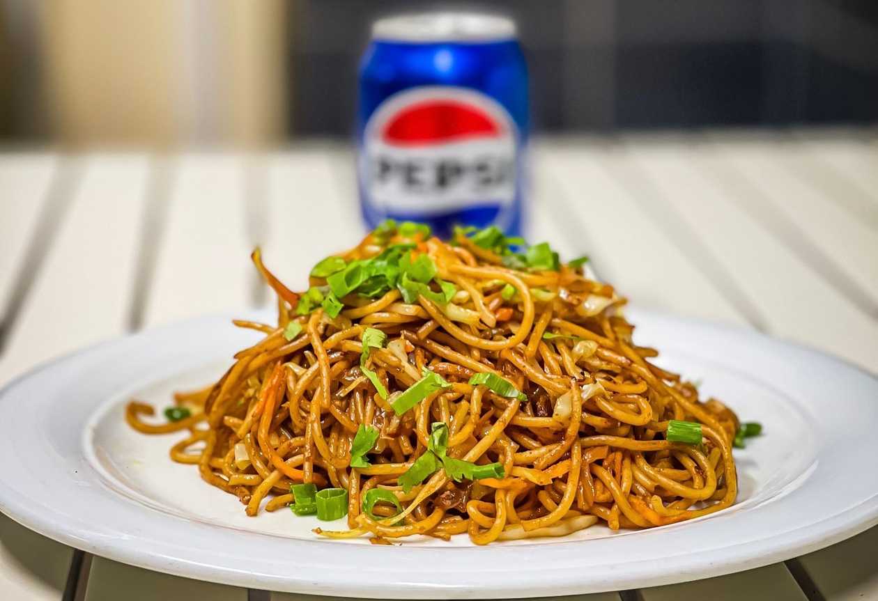 Gurkha’s  chef special veg noodles+330ml pepsi