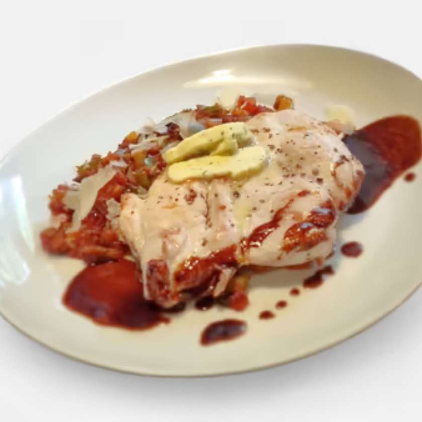 Grilled Chicken Breast with Herb Butter, Roasted Vegetables Ratatouille and Parmesan Shavings