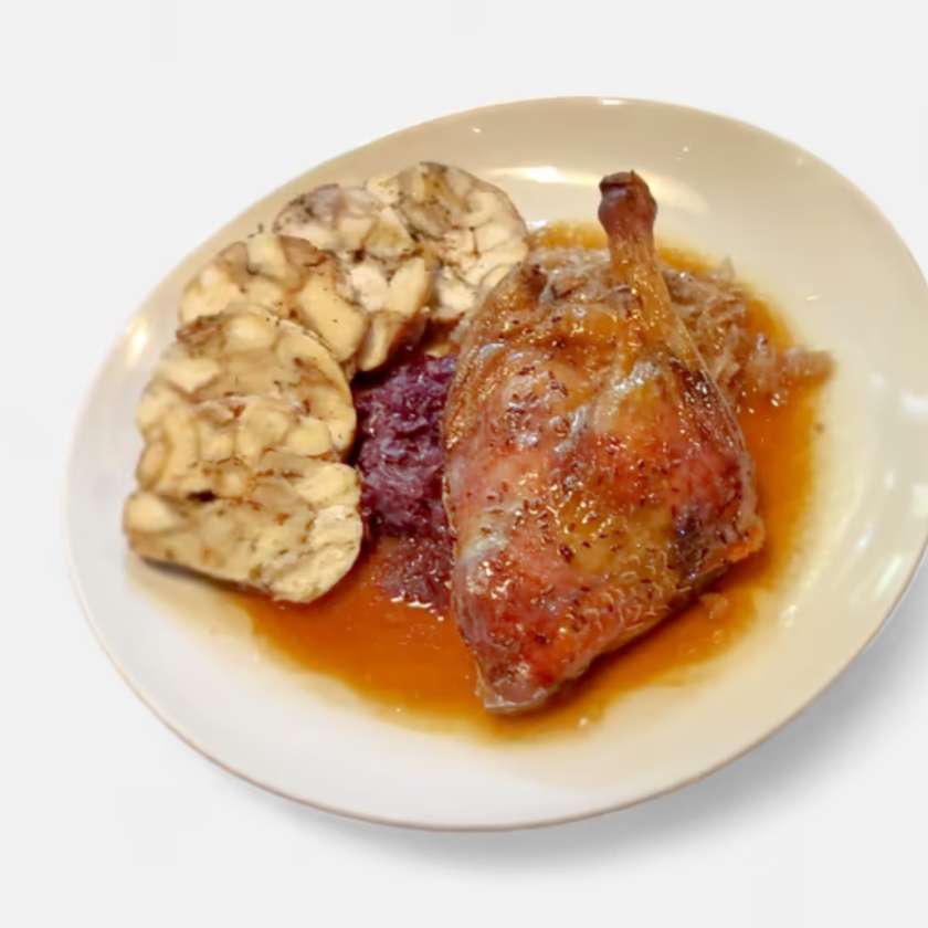 Confited Duck Leg with Bread Dumplings, White and Red Cabbage