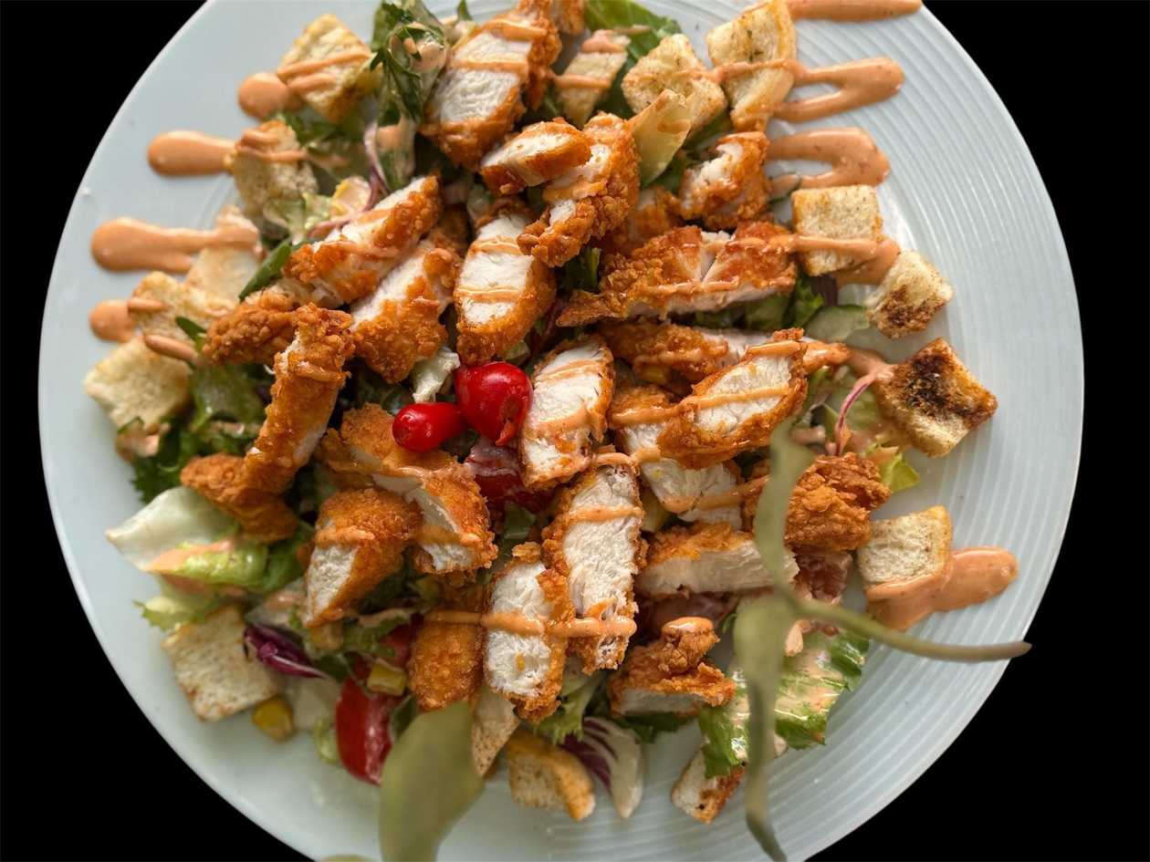 Salad with breaded chicken tenderloin