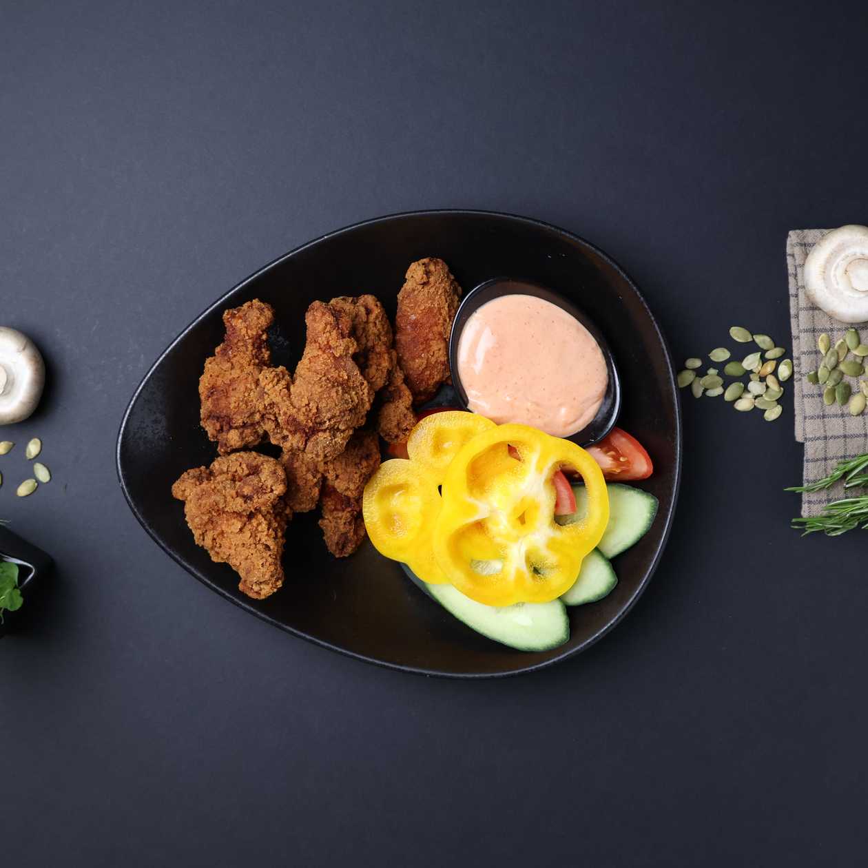 Breaded chicken wings with sauce