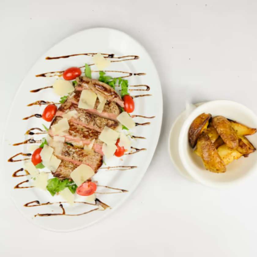 Tagliata Di Manzo With Rucola And Grana