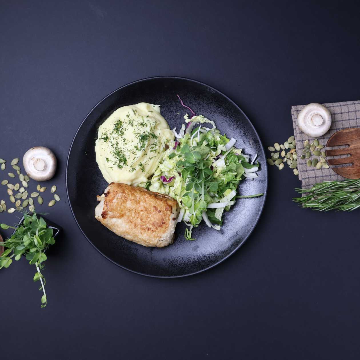 Stuffed chop with cheese and champignons