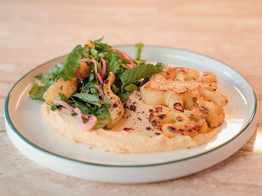 Cauliflower Steak with Hummus and Artichokes