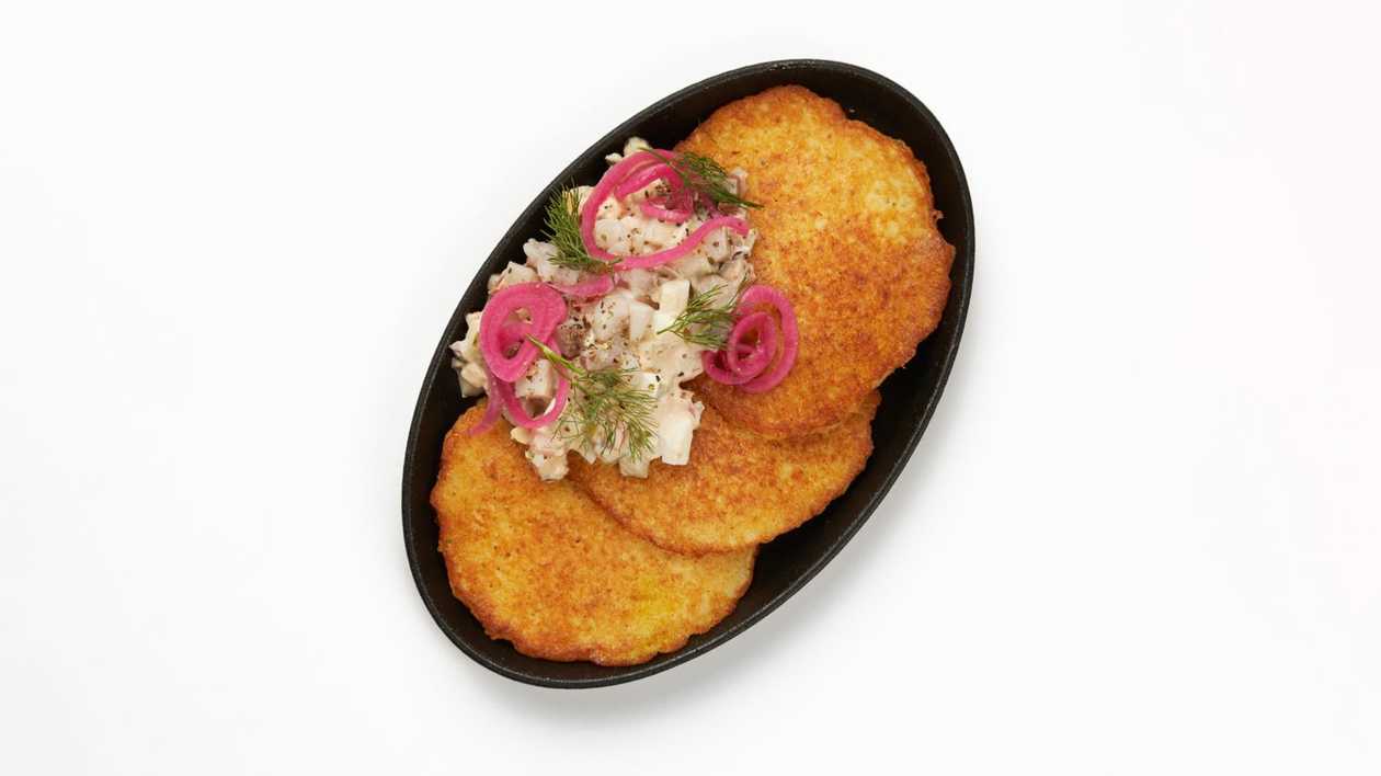 Potato pancakes with herring salad