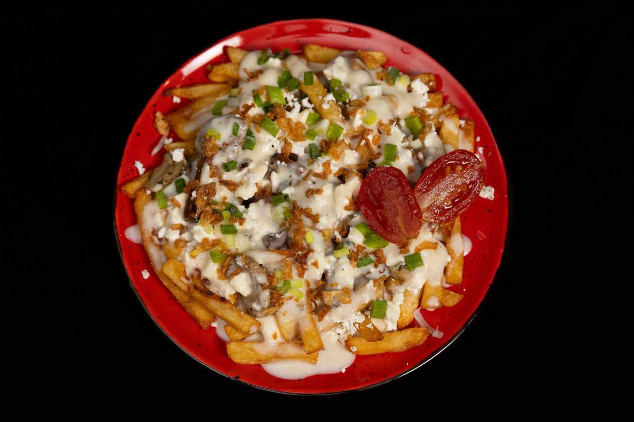 Poutine з білими грибами та лисичками
