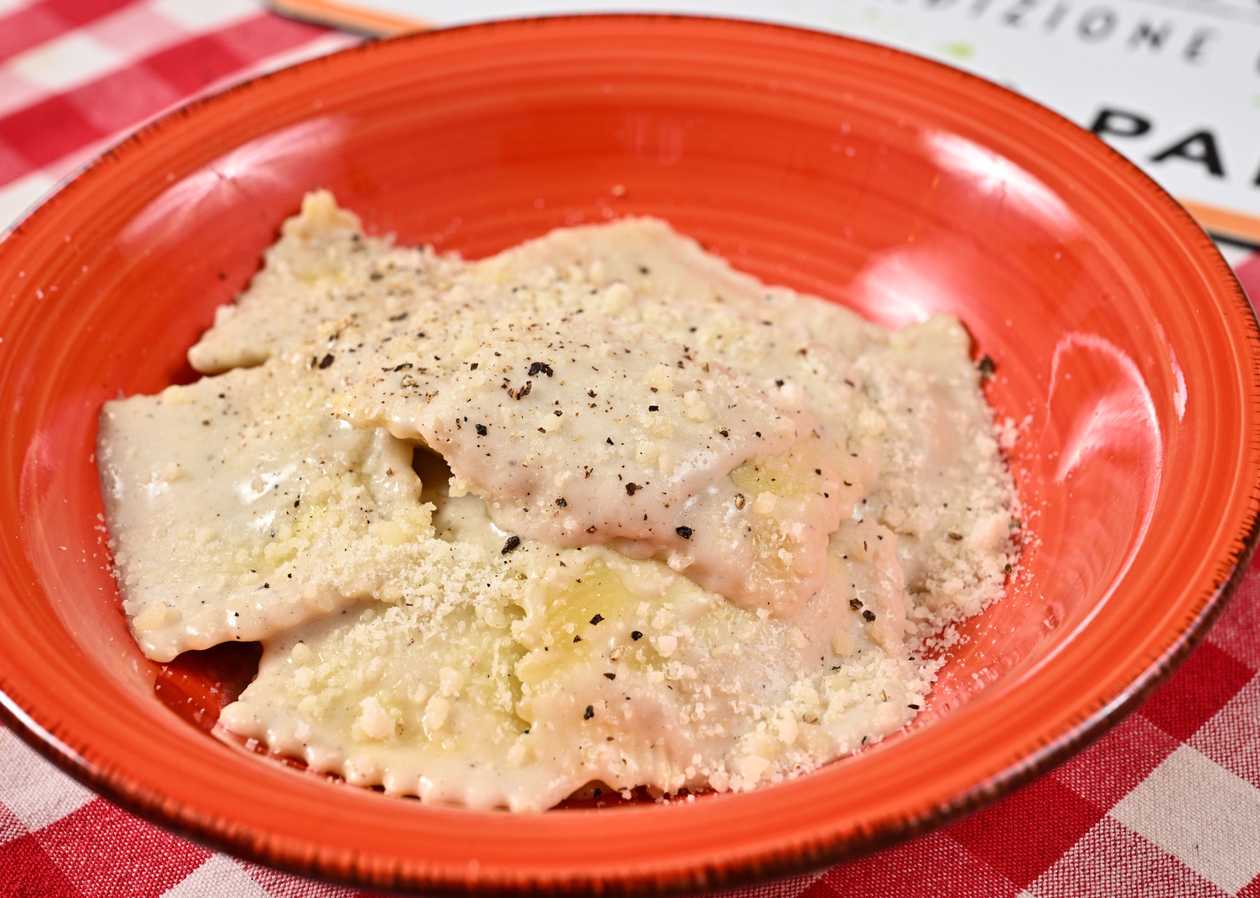 Ravioli with ossobuco and cacio e pepe sauce