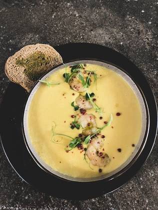 Pumpkin cream soup with shrimps