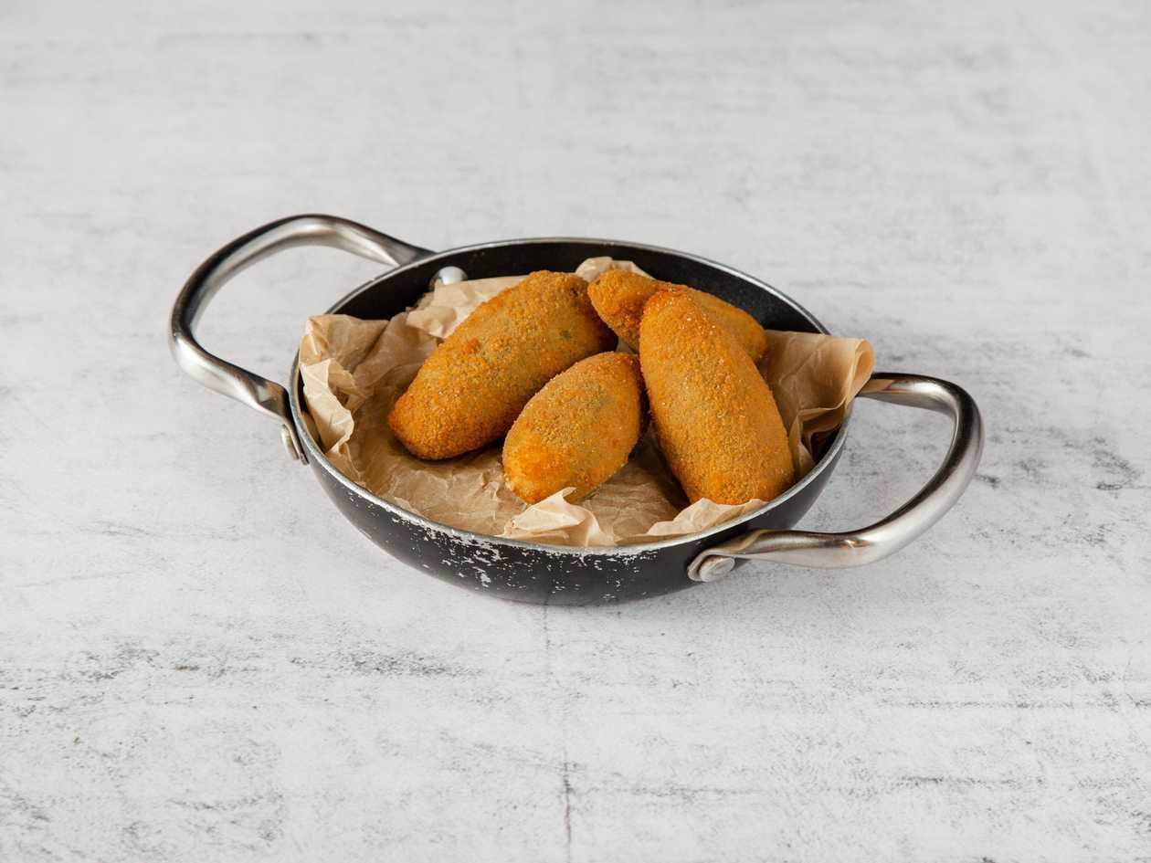 Fried jalapeños stuffed with cheddar cheese