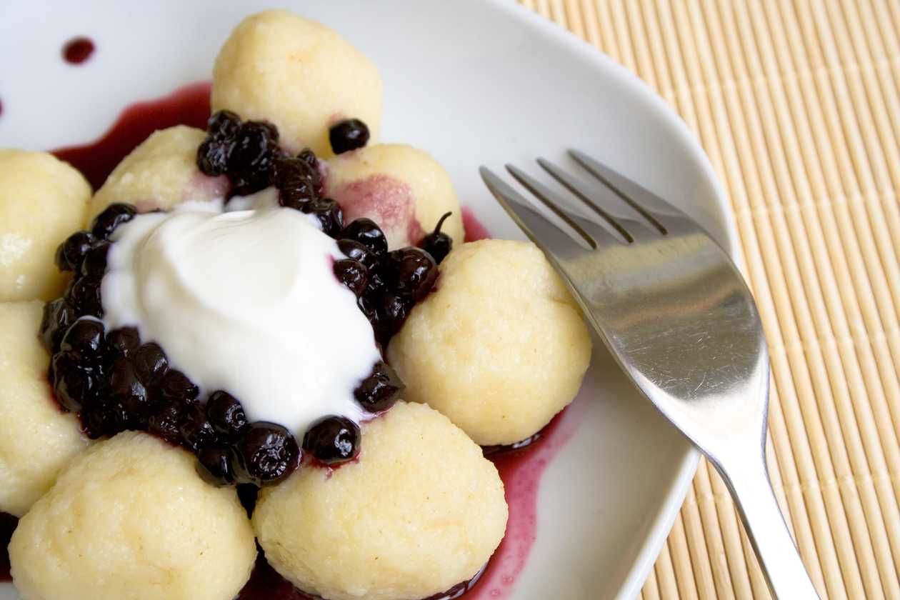Homemade quark dumplings filled with raspberries