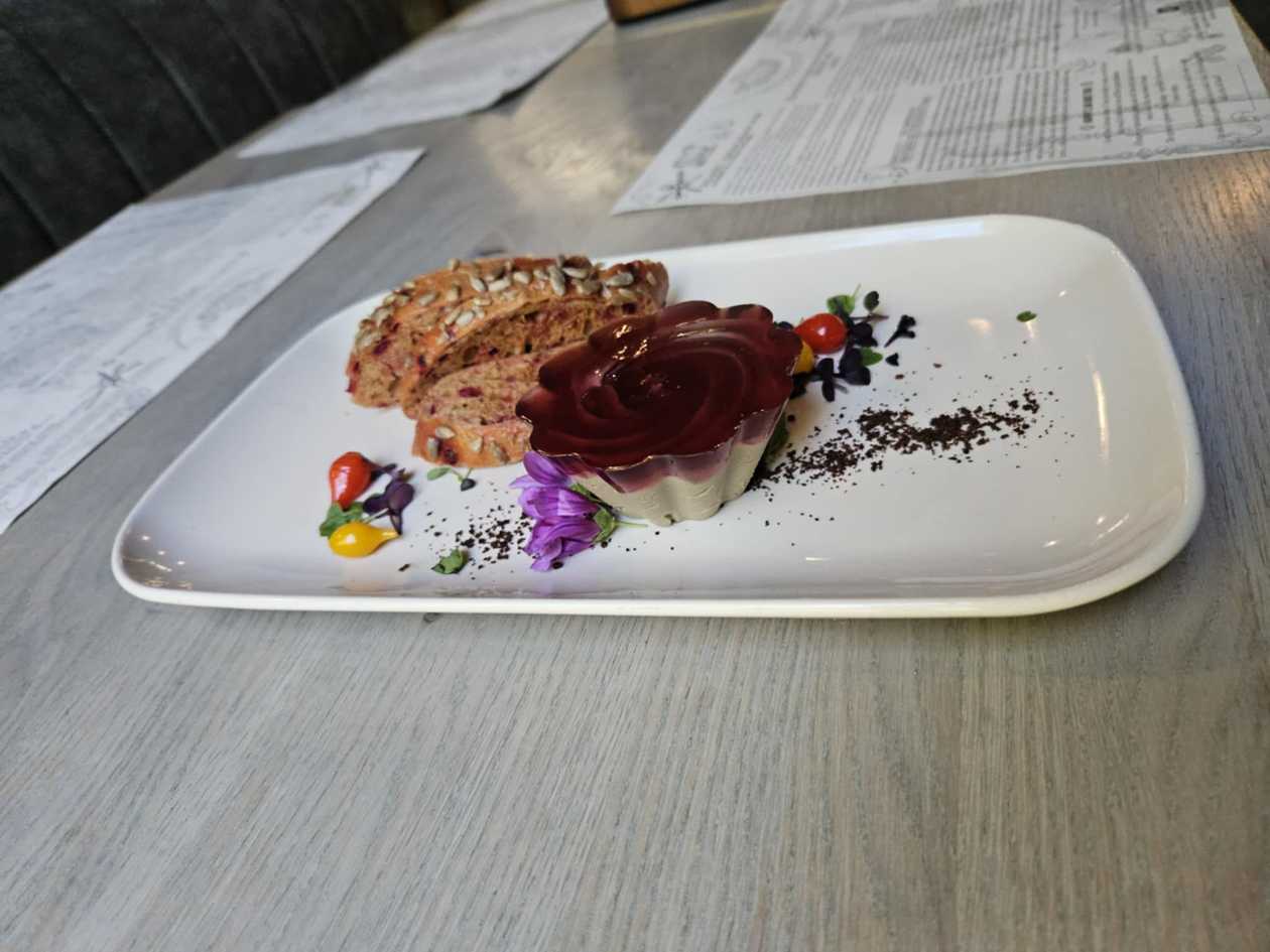 Duck liver pate with cranberry jelly and beetroot bread