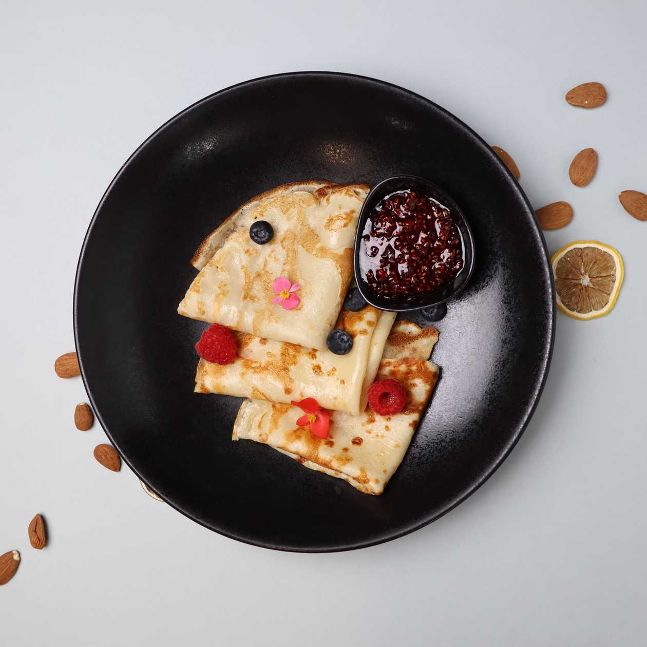 Thin pancakes with jam