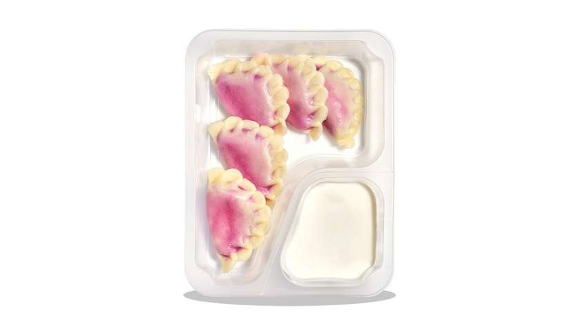 Pierogi with blueberries and sweet yogurt