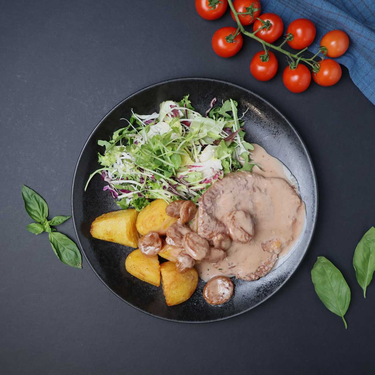 Chicken fillet in red wine sauce with apricots