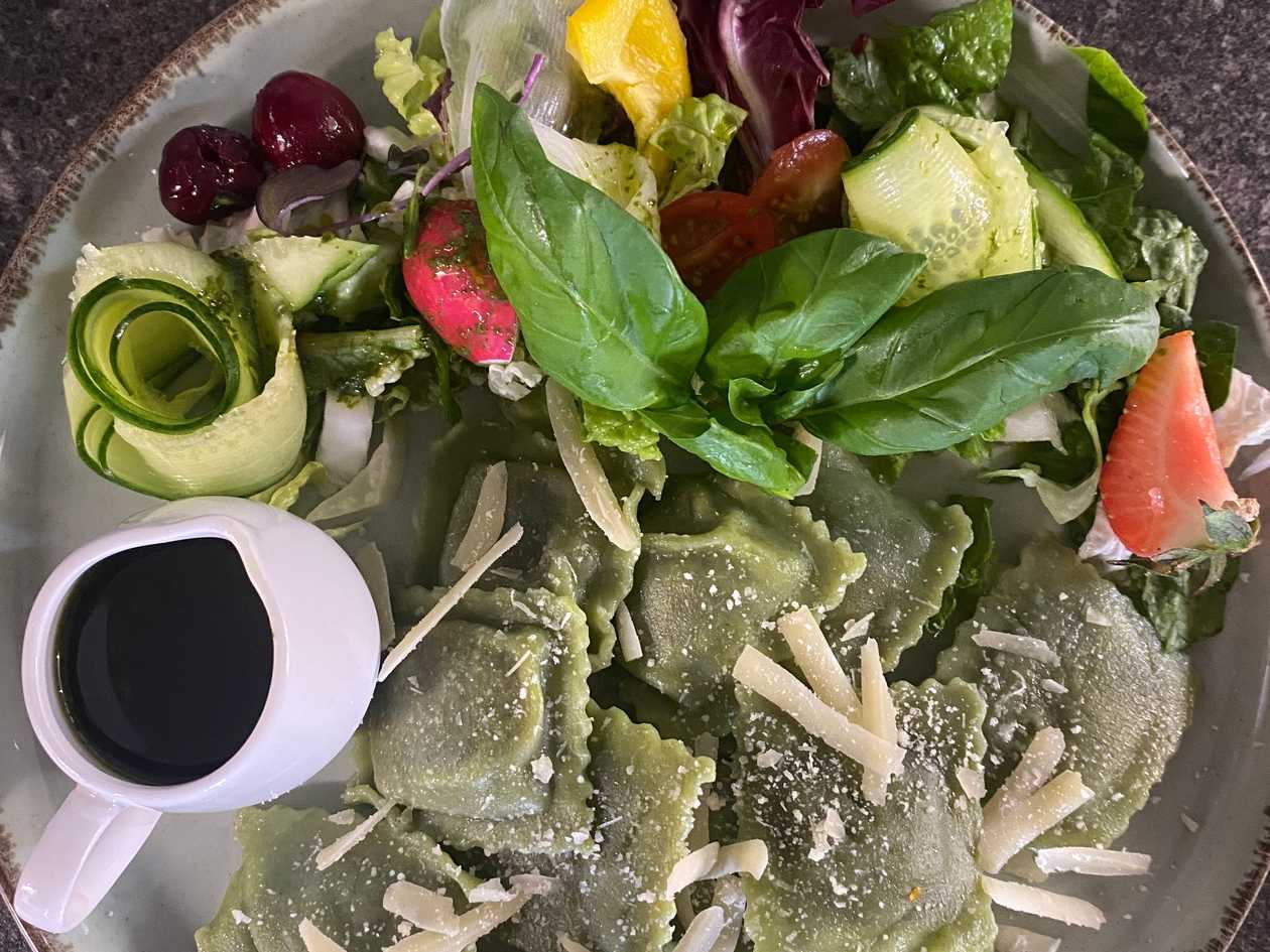 Spinach ravioli stuffed with mushrooms