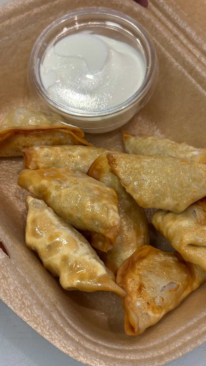 Crispy dumplings with sour cream