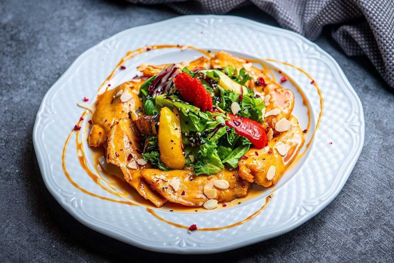 Fried chicken fillet in honey-garlic sauce
