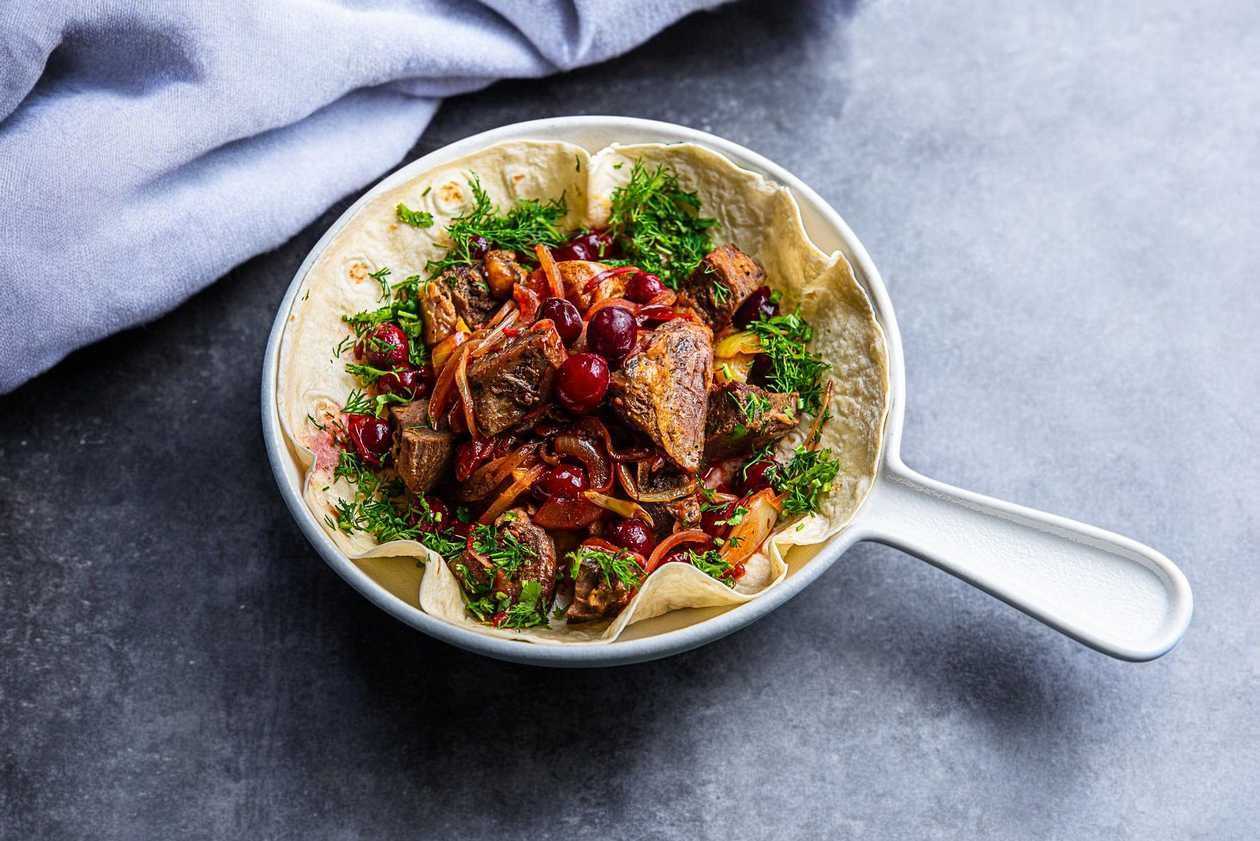 Homemade lamb with cherries