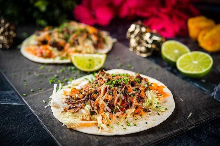 Spicy ground beef taco with Pico de Gallo & Chipotle sauce
