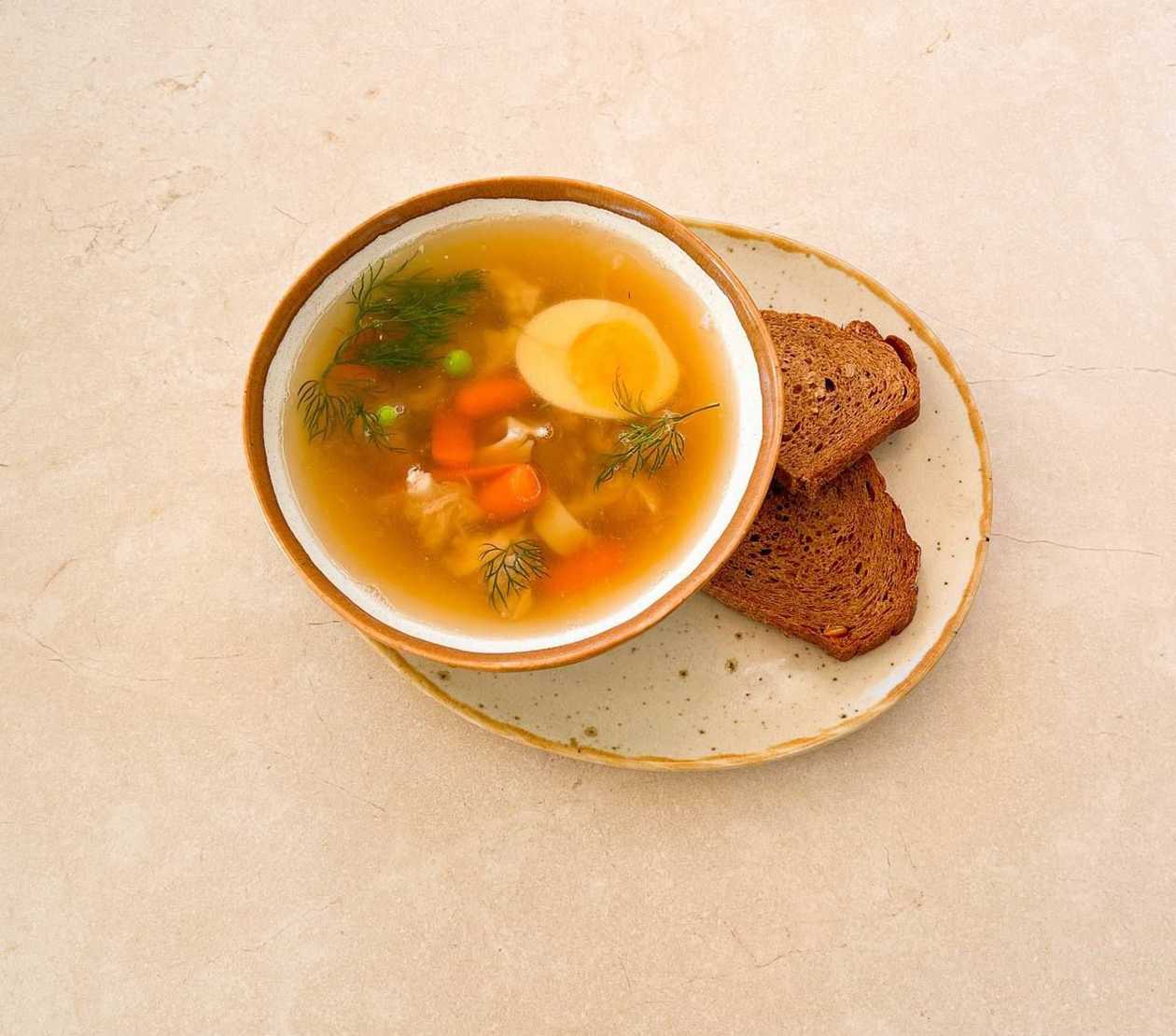 Chicken thigh and noodle broth