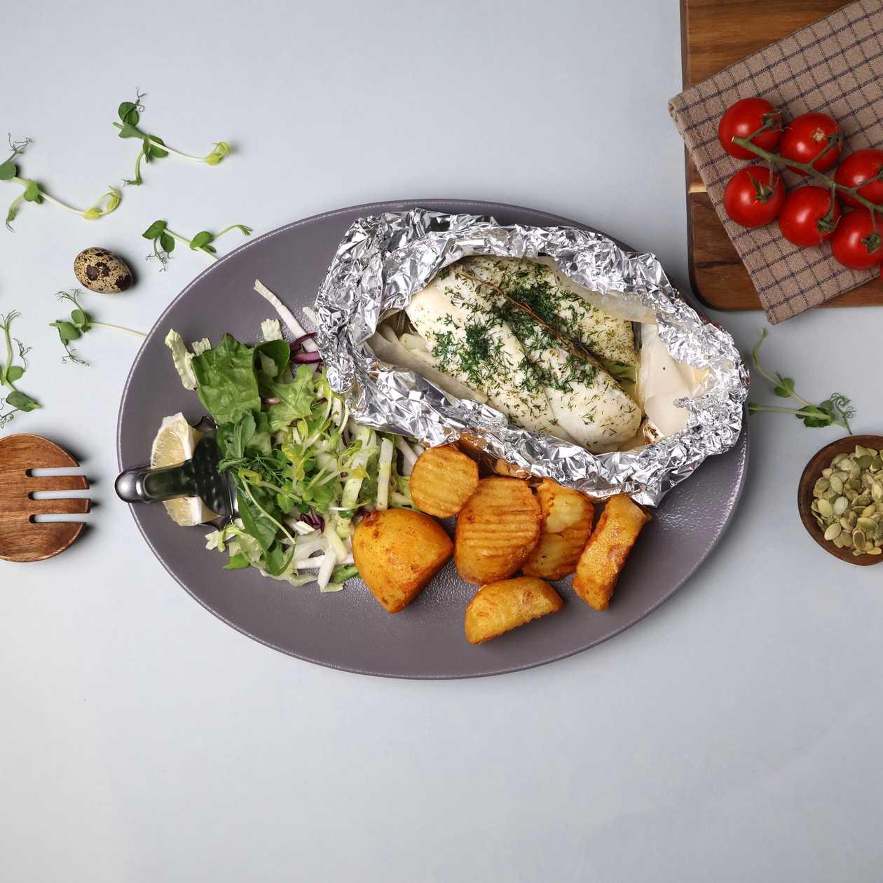 Foil-baked plaice fillet with vegetables