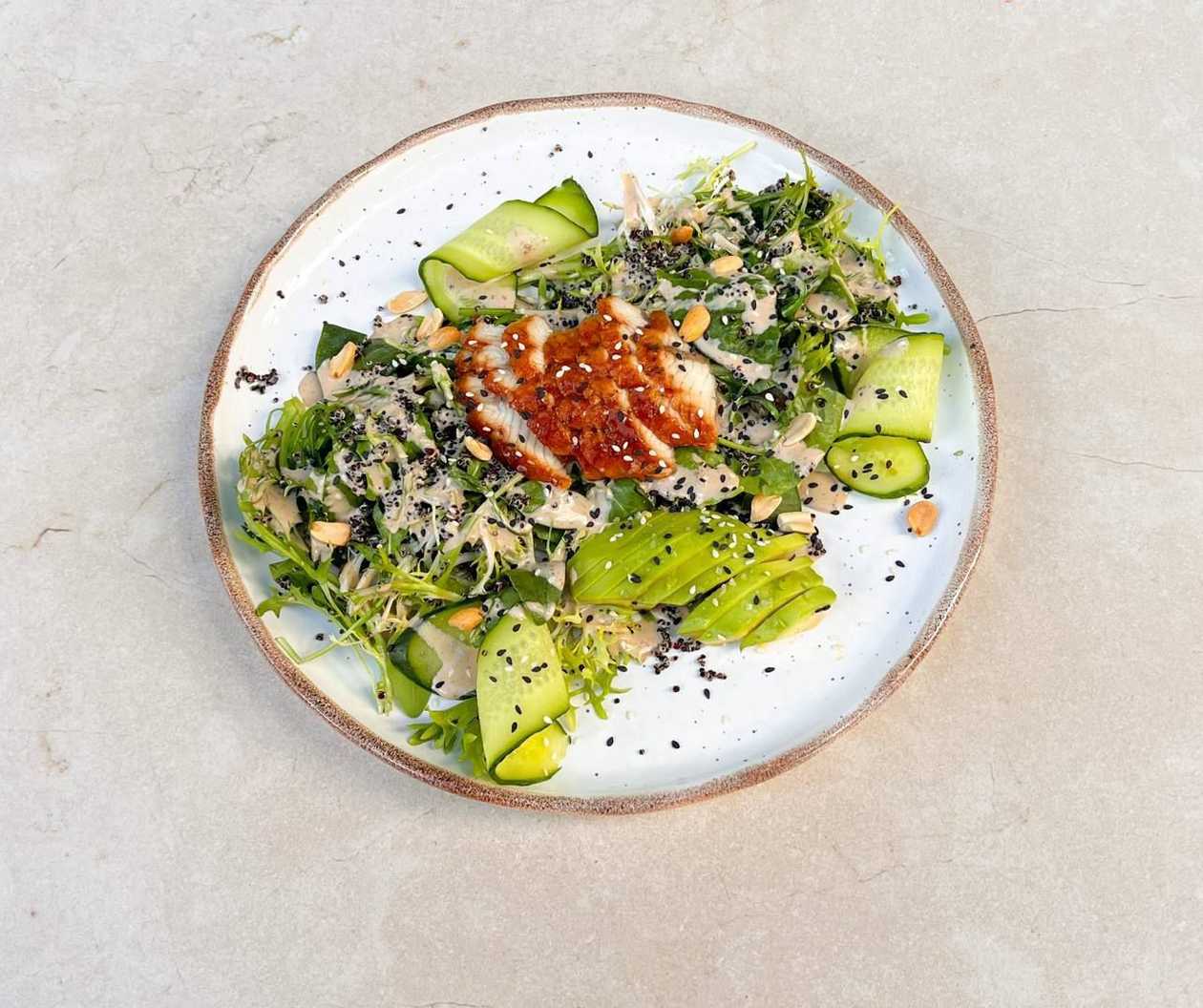 Eel salad with quinoa, chuka seaweed and nut sauce