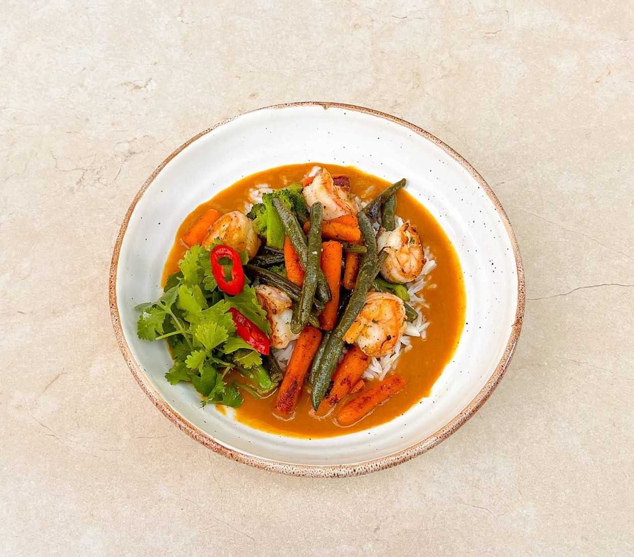 Shrimp with rice and mango-curry sauce