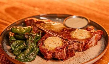 T-Bone with Padron Pepper and Green Peppercorn Sauce