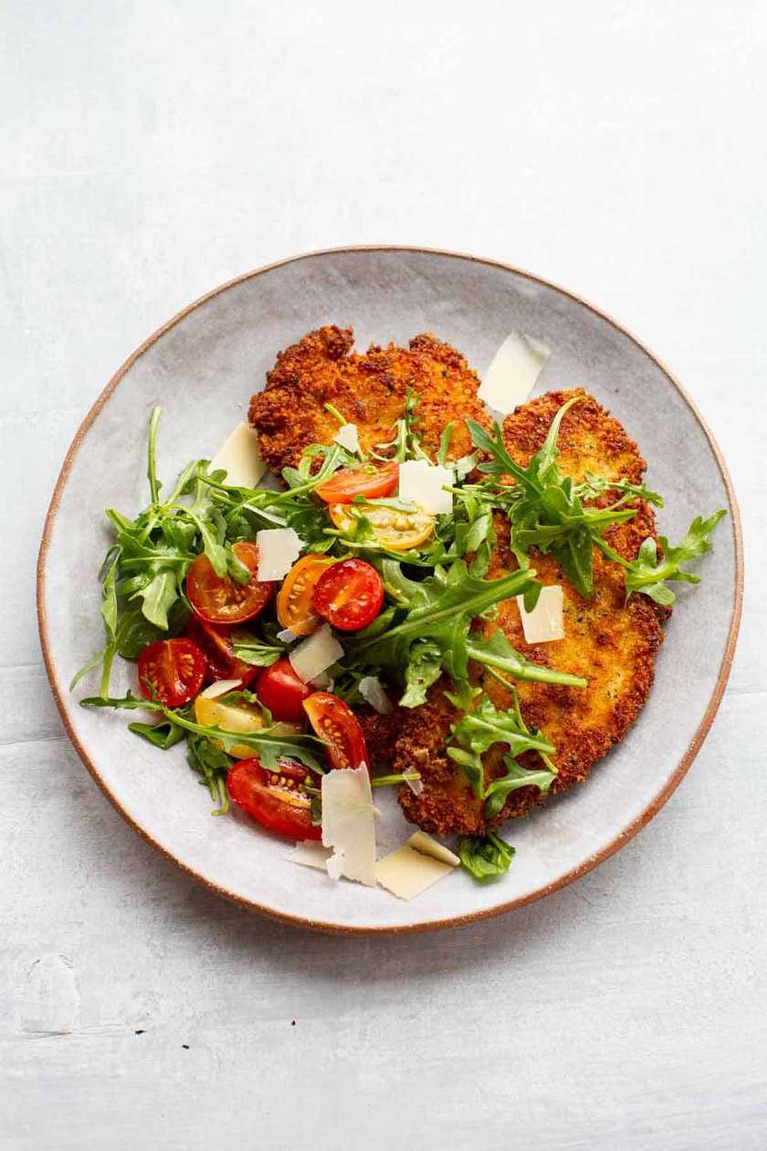 Chicken Nuggets on Italian Salad with Basil and Baguette