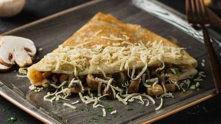 Pancake with mushrooms and cheese