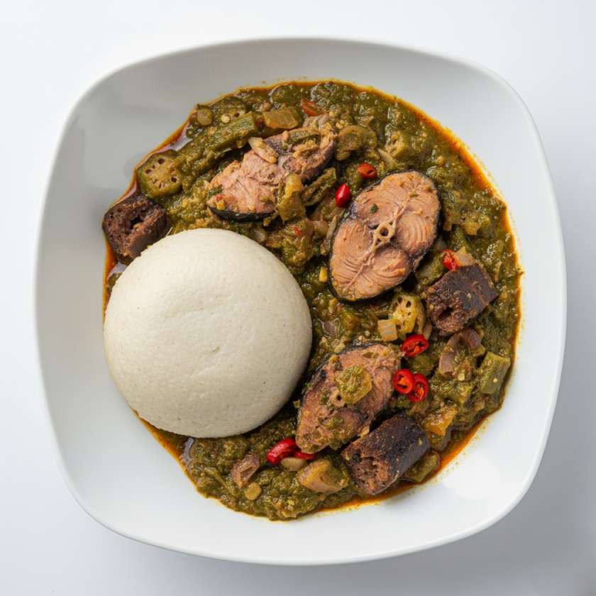 Banku with Okro Stew served with Tuna and Wele