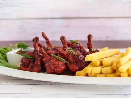 Chicken Lollipop served with Chips