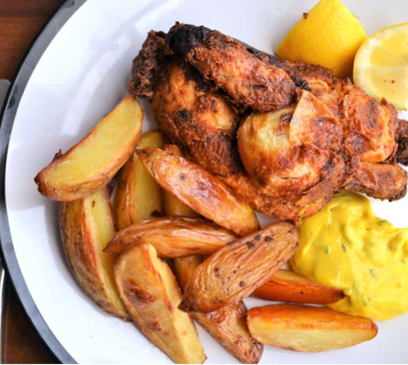 Possin Chicken full served with chips