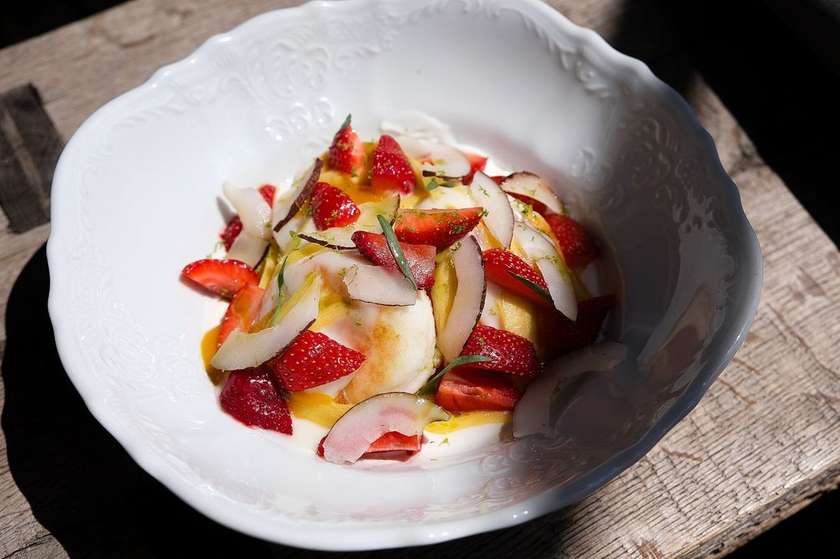 Coconut Cheesecakes with Mango-Passion Fruit Sauce and Cherry