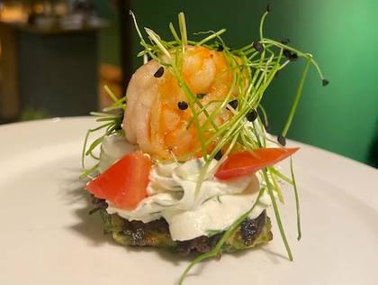 Zucchini pancake, cheese mousse, shrimp, tomato
