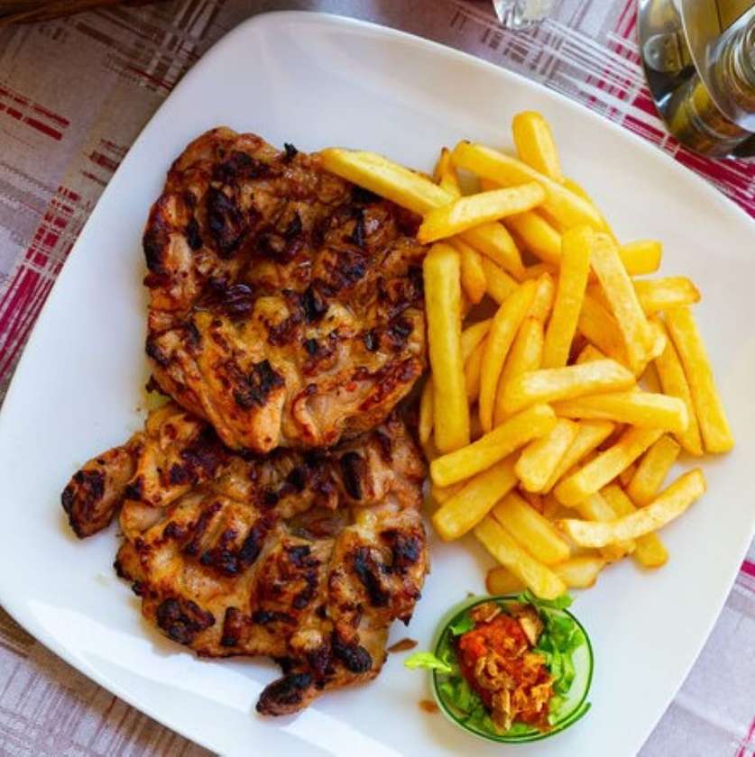 Grilled Boneless Chicken Thighs with French Fries