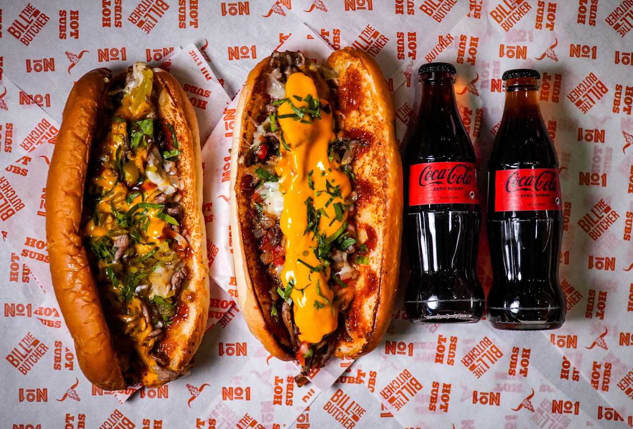 Combo for 2 - Original Philly Cheesesteak + Queso Philly Cheesesteak + 2 Soft Drinks