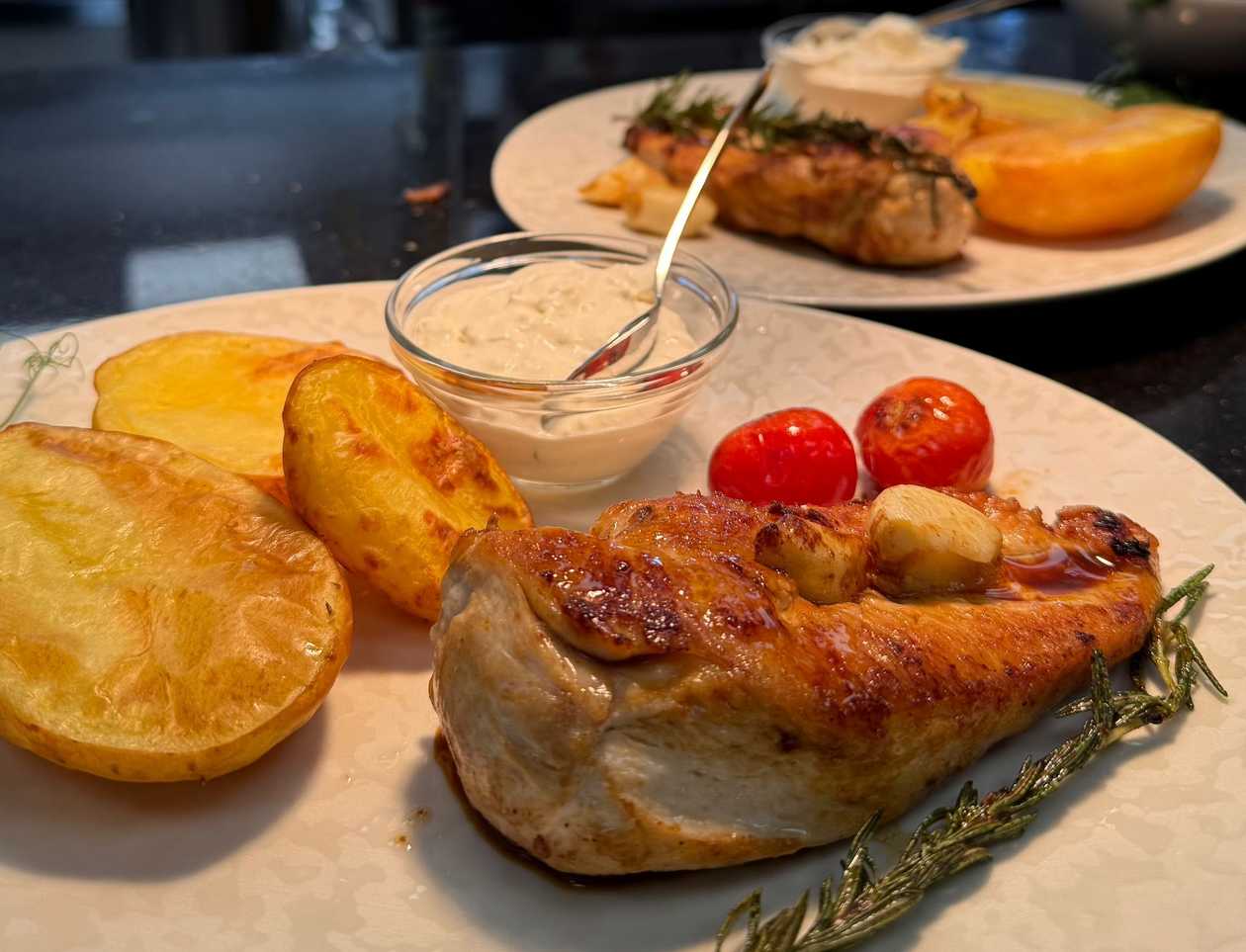 NEW!! Chicken breast pan fried with baked potato and garlic cheese sauce