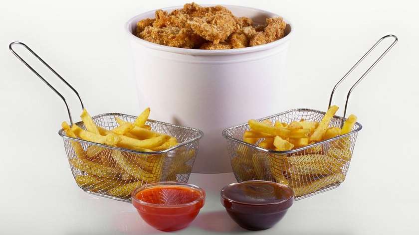 12 Pieces of Chicken Strips in Corn Flakes + 2 Small Fries + 2 Sauces